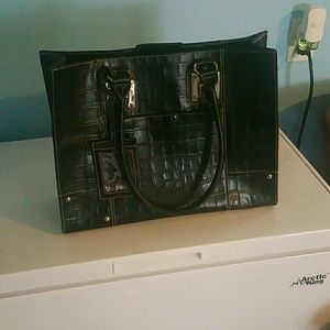 Wilson leather tote bag/lap top carrier.